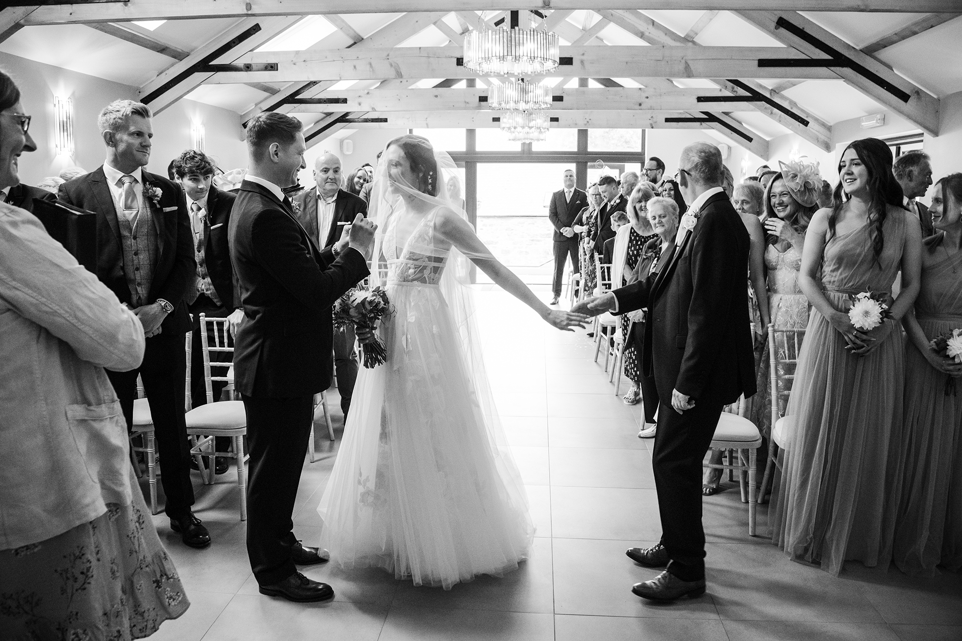 bride walking down the aisle at woodland wedding wales