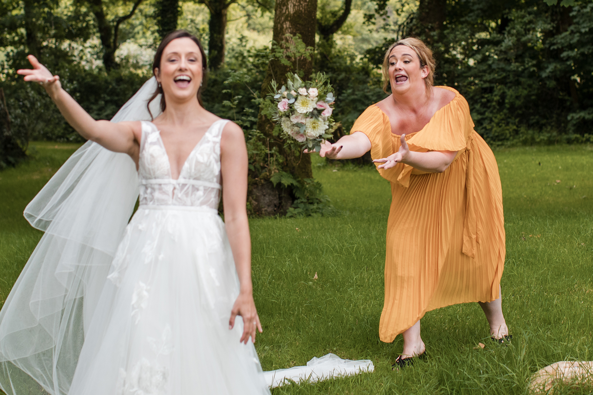 bouquet toss at woodland wedding wales