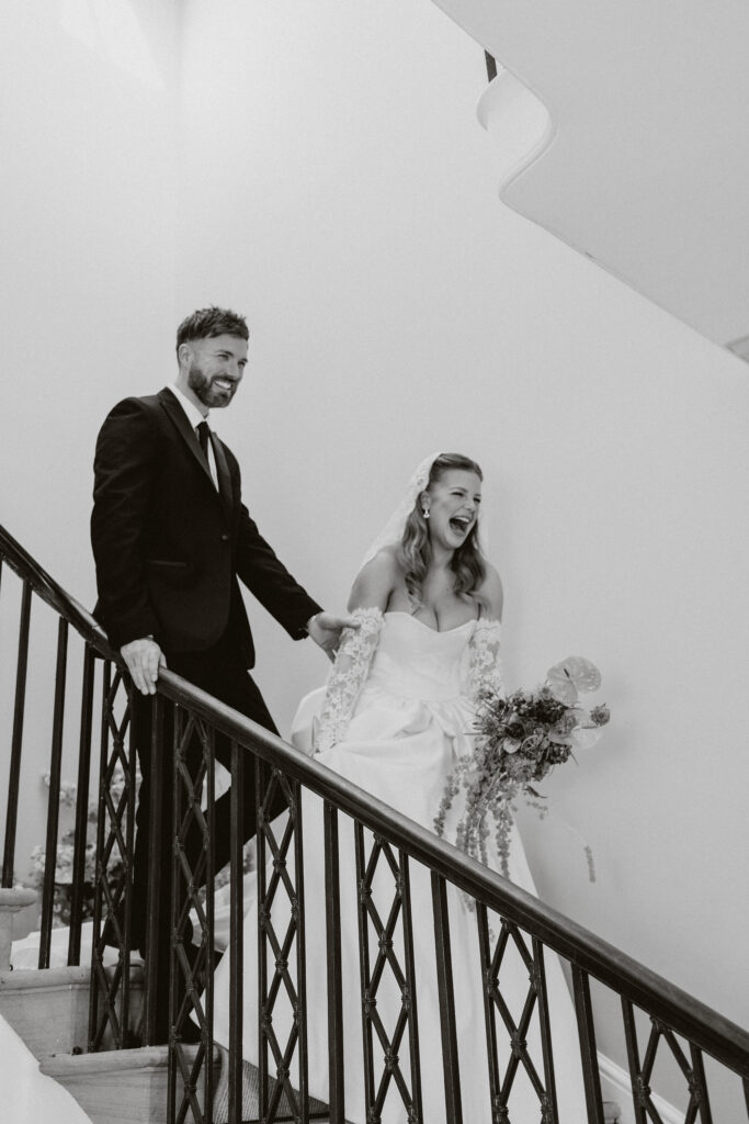 A timeless bridal moment on Garthmyl Hall’s grand staircase – the perfect blend of elegance and romance.