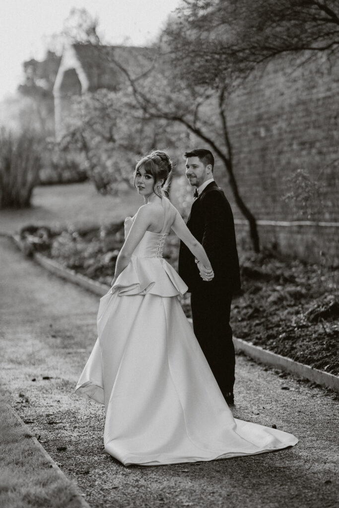 Golden hour magic in Garthmyl Hall’s lush gardens – dreamy outdoor wedding portraits at their fines