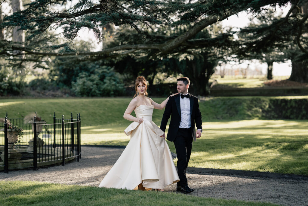 olden hour magic in Garthmyl Hall’s lush gardens – dreamy outdoor wedding portraits at their fines