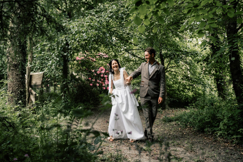 Hilton Court wedding venue near Roch, Pembrokeshire — woodland gardens and lily ponds with St Brides Bay sea views